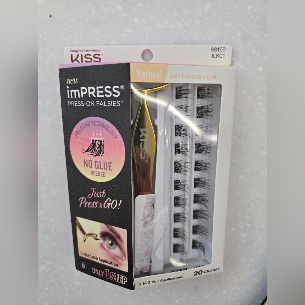Kiss imPRESS Natural Press-On Lashes with Black and Gold. I have Two Of These.